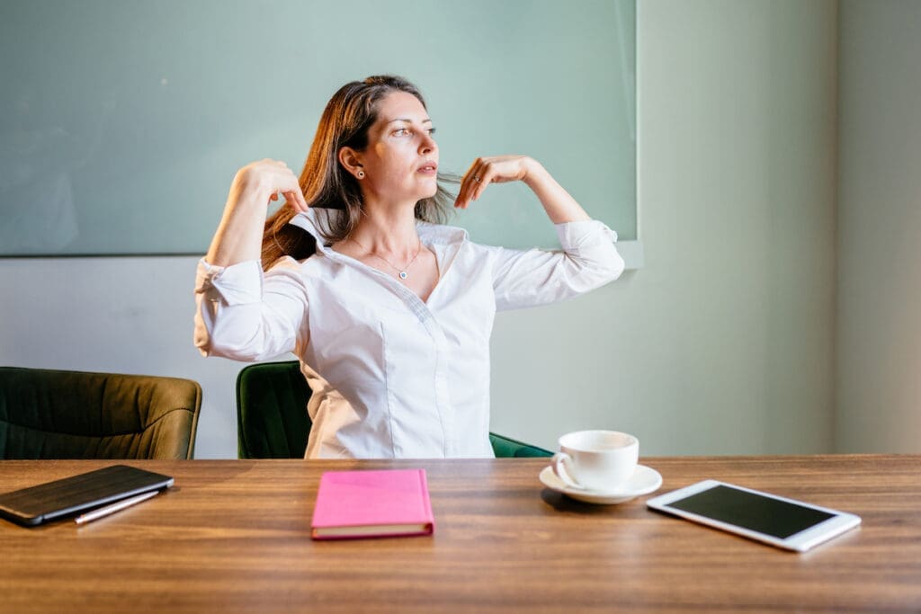 A menopausal woman having a hot flush